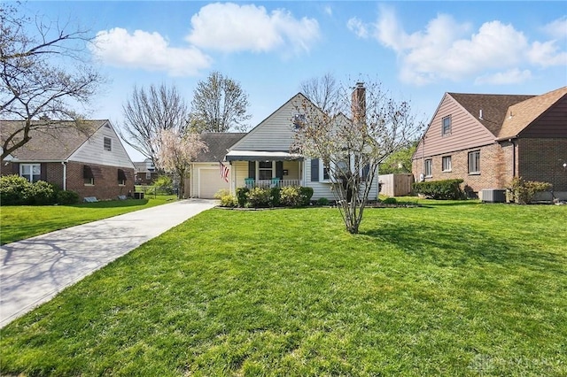 1236 Ridgeview Ave, Kettering, OH 45409 - view of front of property with a chimney, driveway, a garage, and a porch