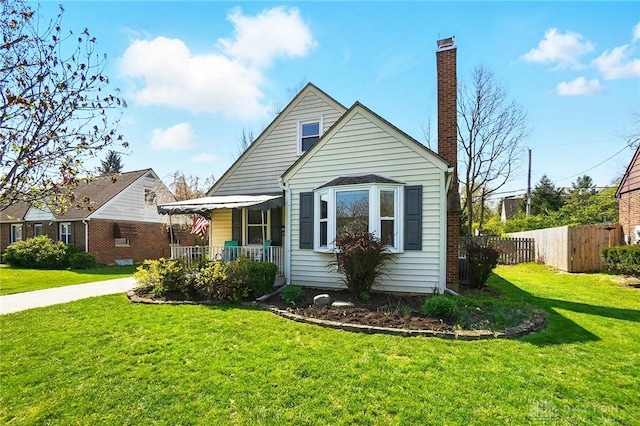 1236 Ridgeview Ave, Kettering, OH 45409 - bungalow-style home featuring covered porch and a chimney