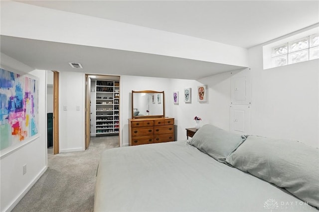 1236 Ridgeview Ave, Kettering, OH 45409 - carpeted bedroom with baseboards and a walk in closet