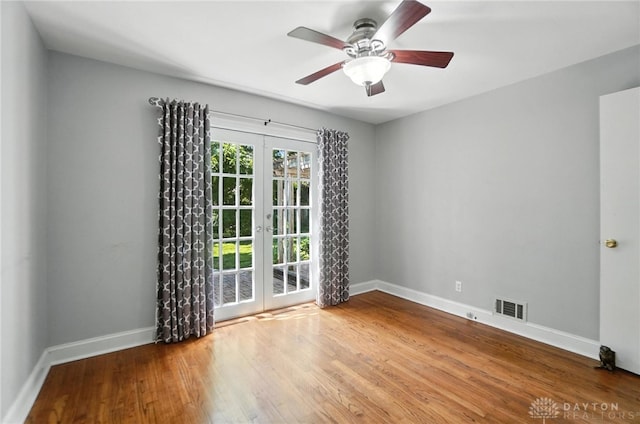 1236 Ridgeview Ave, Kettering, OH 45409 - spare room featuring wood finished floors, a ceiling fan, and french doors
