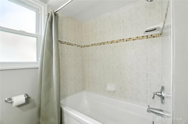 1236 Ridgeview Ave, Kettering, OH 45409 - full bath with healthy amount of natural light and shower / bath combo with shower curtain