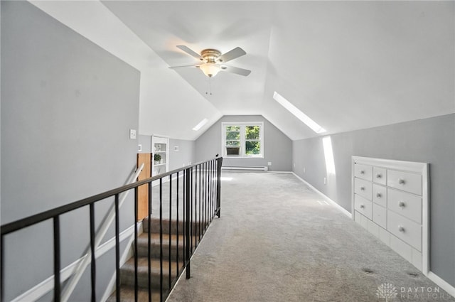 1236 Ridgeview Ave, Kettering, OH 45409 - additional living space with baseboard heating, vaulted ceiling, a ceiling fan, and carpet flooring