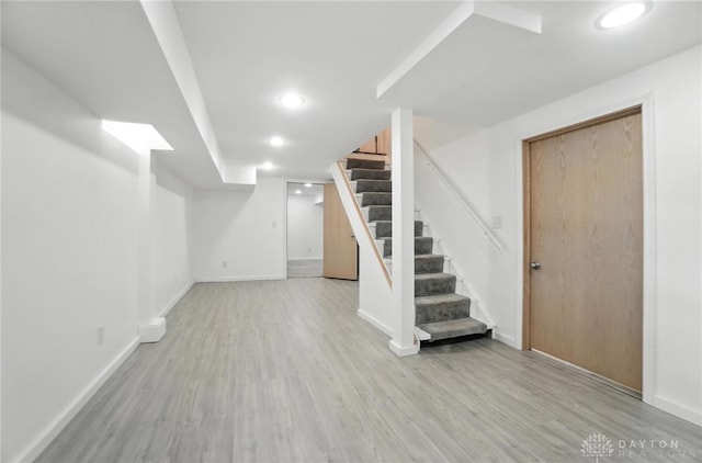 1236 Ridgeview Ave, Kettering, OH 45409 - finished basement with stairway, wood finished floors, and recessed lighting