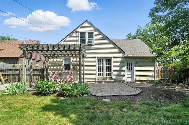 1236 Ridgeview Ave, Kettering, OH 45409 - back of house featuring a pergola, a patio area, a shingled roof, and cooling unit