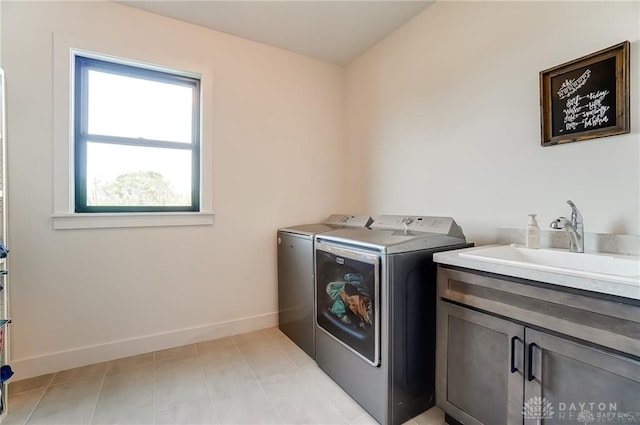 1264 Normandy, Clearcreek Twp, OH 45458 - laundry room featuring washer and dryer, cabinet space, and baseboards