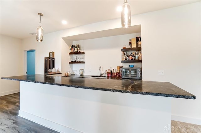 1264 Normandy, Clearcreek Twp, OH 45458 - indoor wet bar featuring wood finished floors, pendant lighting, and baseboards