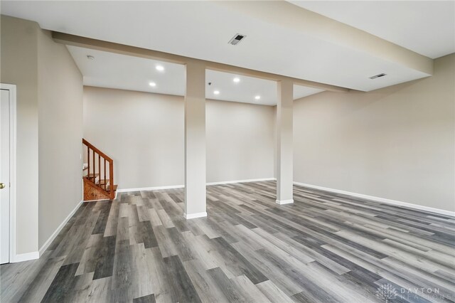 2337 Eastwind Dr, Beavercreek, OH 45434 - finished basement with recessed lighting, wood finished floors, baseboards, and stairs