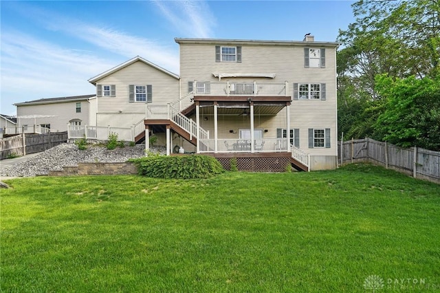 2337 Eastwind Dr, Beavercreek, OH 45434 - rear view of house featuring stairway, a deck, and a chimney