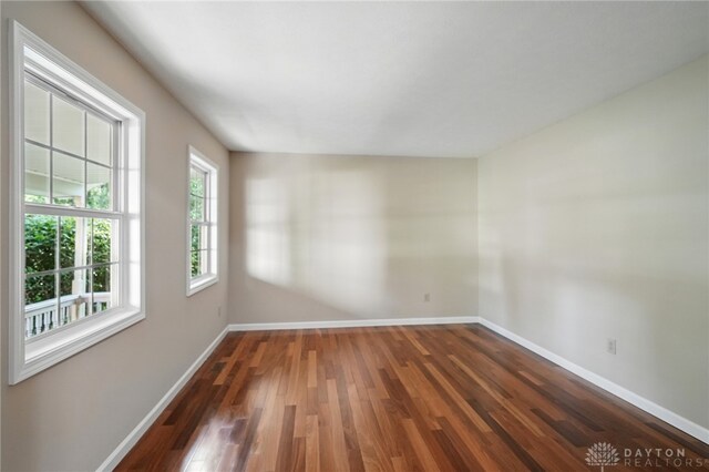 2337 Eastwind Dr, Beavercreek, OH 45434 - spare room with baseboards and wood finished floors