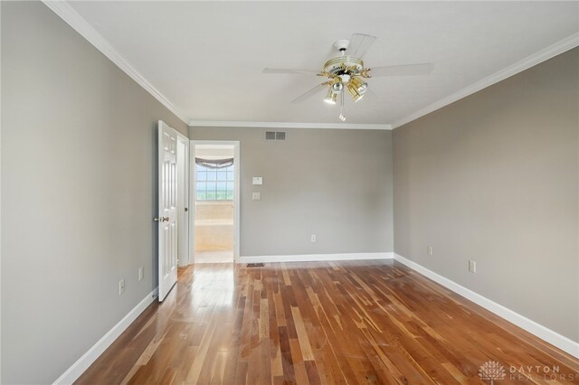 2337 Eastwind Dr, Beavercreek, OH 45434 - unfurnished room featuring ceiling fan, hardwood / wood-style flooring, baseboards, and ornamental molding