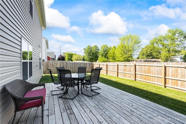 wooden deck featuring outdoor dining space