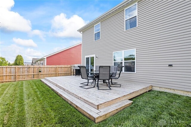 deck featuring outdoor dining area