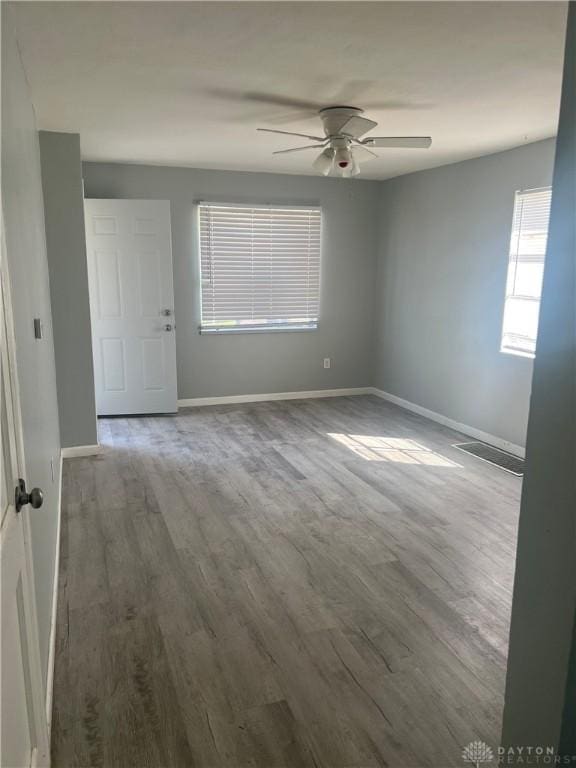 1155 Linda Vista Ave, Dayton, OH 45405 - spare room with wood finished floors, baseboards, and ceiling fan