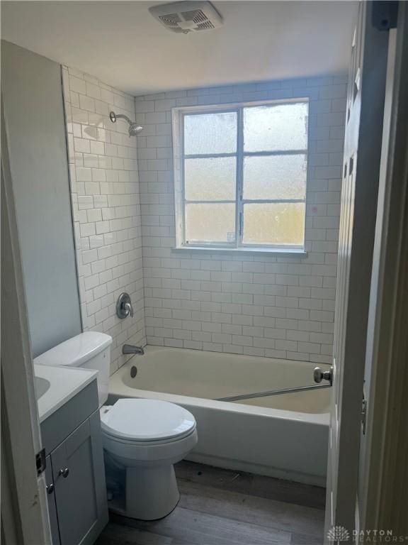 1155 Linda Vista Ave, Dayton, OH 45405 - full bath with vanity, wood finished floors, toilet, and  shower combination