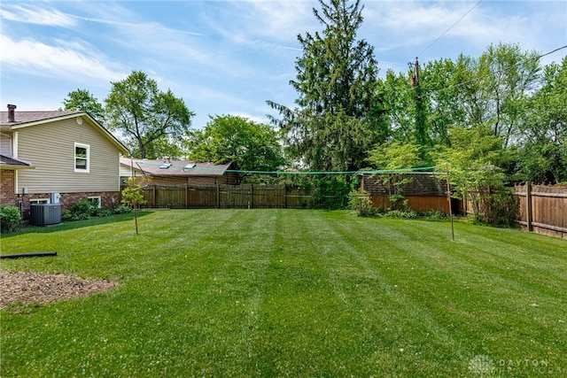 view of yard featuring central AC