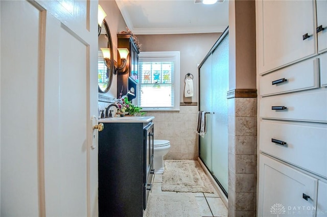 401 Hadley Ave, Dayton, OH 45419 - full bath featuring ornamental molding, vanity, a stall shower, tile walls, and toilet
