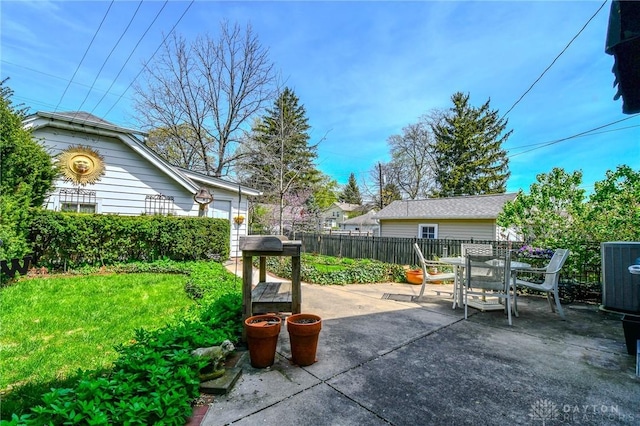 401 Hadley Ave, Dayton, OH 45419 - view of patio with outdoor dining space and cooling unit