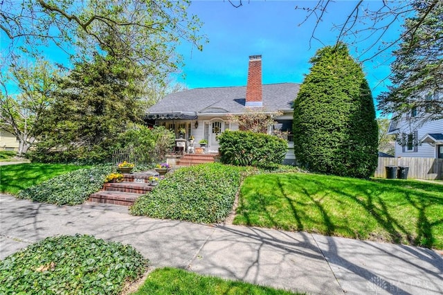 401 Hadley Ave, Dayton, OH 45419 - view of front facade featuring a chimney and a porch