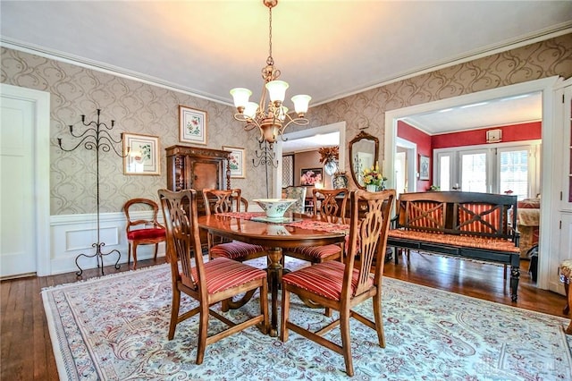 401 Hadley Ave, Dayton, OH 45419 - dining area featuring wallpapered walls, a chandelier, hardwood / wood-style floors, crown molding, and a wainscoted wall