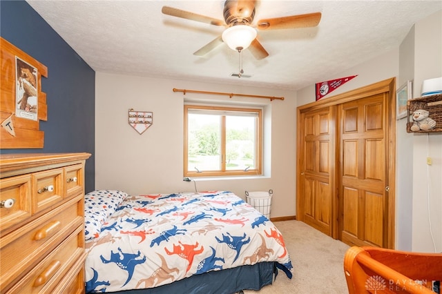 143 Summerfield Ln, Lebanon, OH 45036 - bedroom featuring light colored carpet, a closet, and ceiling fan