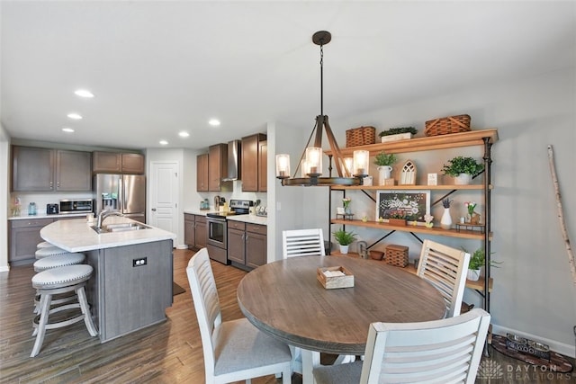 1535 Mulberry Ct, Turtlecreek Twp, OH 45036 - dining area with recessed lighting and dark wood finished floors