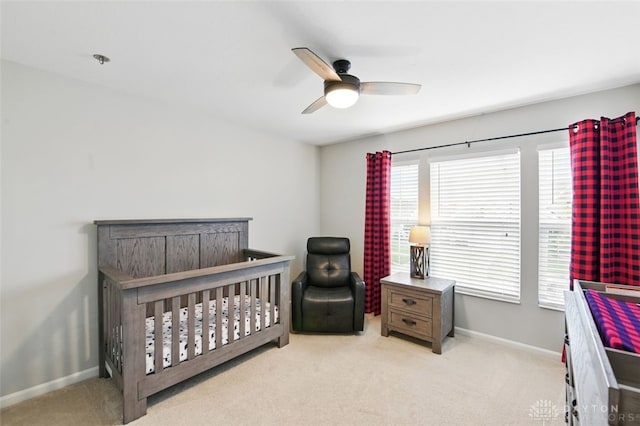 1535 Mulberry Ct, Turtlecreek Twp, OH 45036 - carpeted bedroom featuring baseboards, a nursery area, and ceiling fan