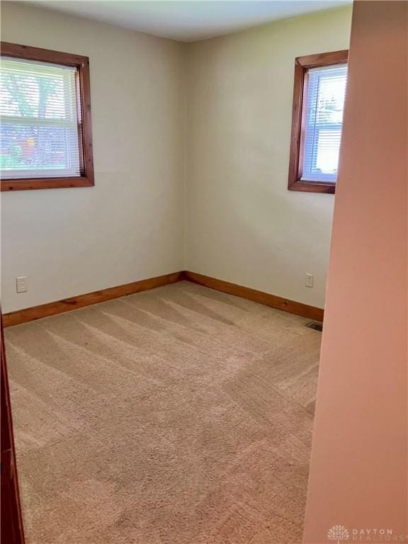 201 Applegate Rd, Union, OH 45322 - spare room with healthy amount of natural light and light colored carpet