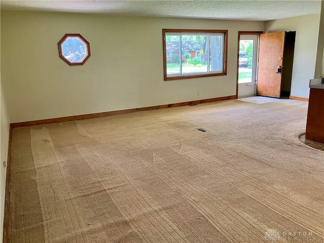 201 Applegate Rd, Union, OH 45322 - spare room with light carpet and a textured ceiling