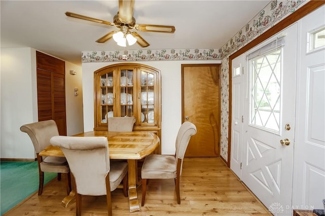 5061 Grossepointe Ln, Delhi Twp, OH 45238 - dining space featuring light wood finished floors and a ceiling fan