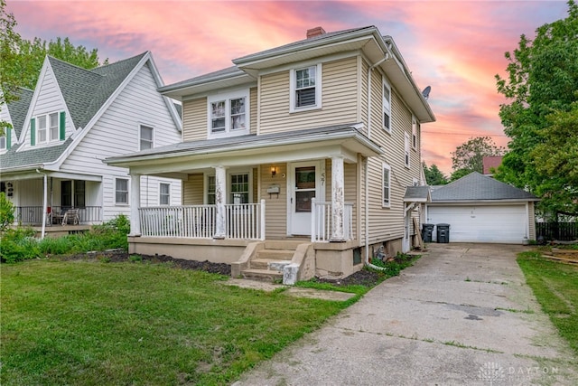 57 W Maplewood Ave, Dayton, OH 45405 - traditional style home with covered porch, a garage, an outbuilding, a lawn, and a chimney