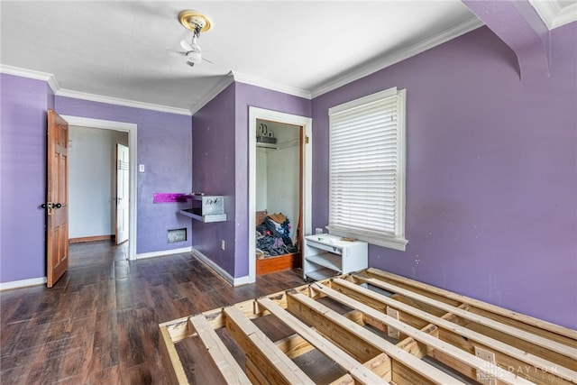 57 W Maplewood Ave, Dayton, OH 45405 - unfurnished bedroom with multiple windows, wood finished floors, ornamental molding, and a closet