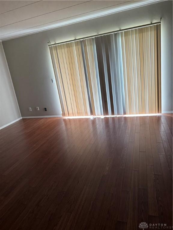 1109 Arrowhead Xing Unit A, West Carrollton, OH 45449 - unfurnished room with dark wood finished floors and baseboards