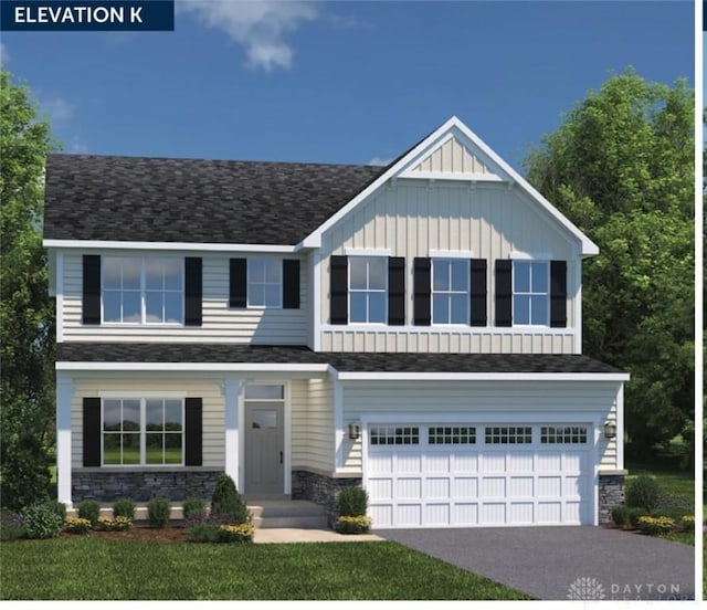 3583 Arrowwood St, Tipp City, OH 45371 - craftsman inspired home featuring stone siding, board and batten siding, and an attached garage