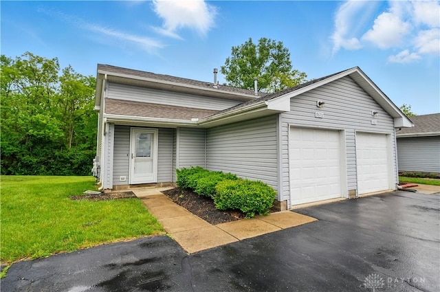 9670 Centerville Creek Ln, Washington Twp, OH 45458 - view of front of property featuring a front lawn, an attached garage, and roof with shingles