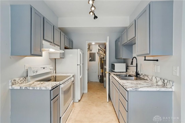 9670 Centerville Creek Ln, Washington Twp, OH 45458 - kitchen featuring white appliances, under cabinet range hood, a sink, gray cabinetry, and light countertops