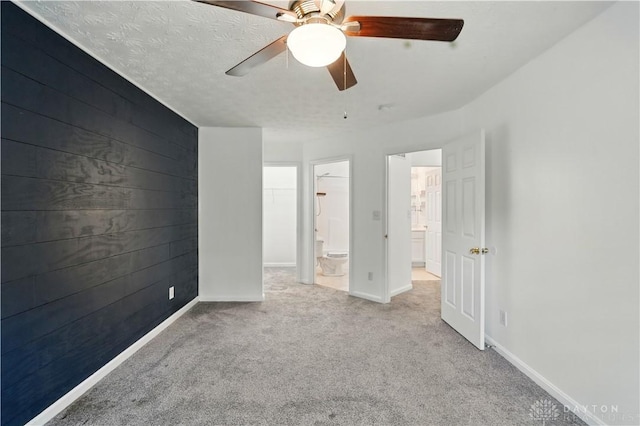 9670 Centerville Creek Ln, Washington Twp, OH 45458 - unfurnished bedroom with carpet flooring, baseboards, ceiling fan, and connected bathroom