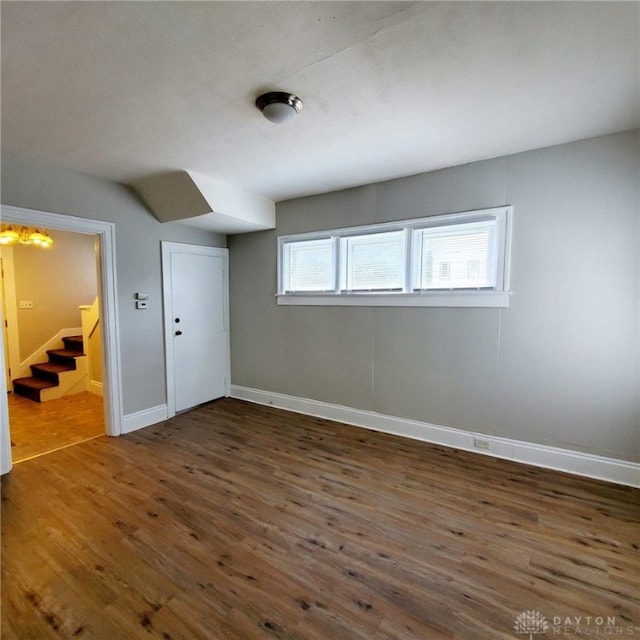 1271 Highland Ave, Dayton, OH 45410 - spare room with wood finished floors and stairs