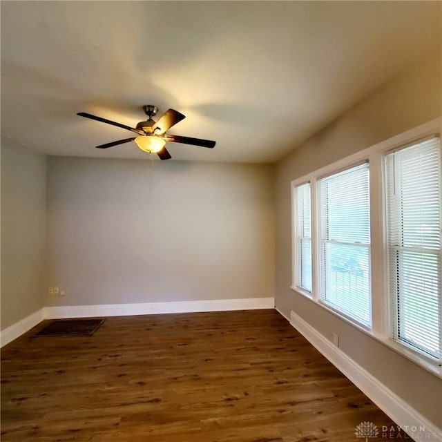 1271 Highland Ave, Dayton, OH 45410 - empty room featuring dark wood-style flooring and ceiling fan