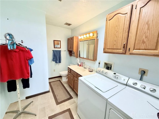 5778 Cedarwood Dr, Lewisburg, OH 45338 - washroom featuring washer and clothes dryer and baseboards