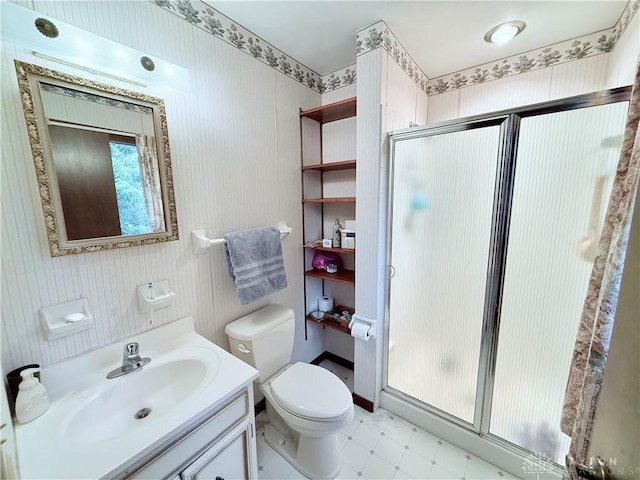 5778 Cedarwood Dr, Lewisburg, OH 45338 - full bathroom with a stall shower, toilet, vanity, tile patterned floors, and wallpapered walls