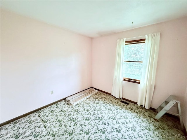 5778 Cedarwood Dr, Lewisburg, OH 45338 - unfurnished room with carpet floors and baseboards