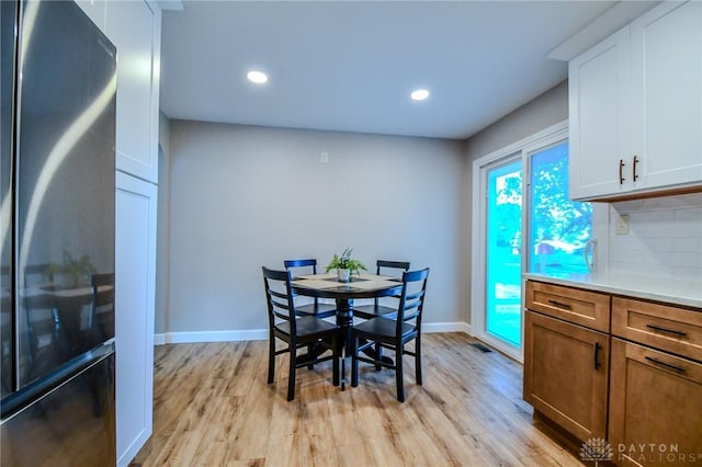 4189 W Franklin St, Bellbrook, OH 45305 - dining area with light wood-type flooring and recessed lighting