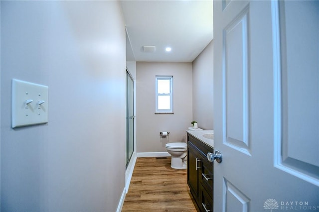 4189 W Franklin St, Bellbrook, OH 45305 - full bath with vanity, a shower stall, and wood finished floors