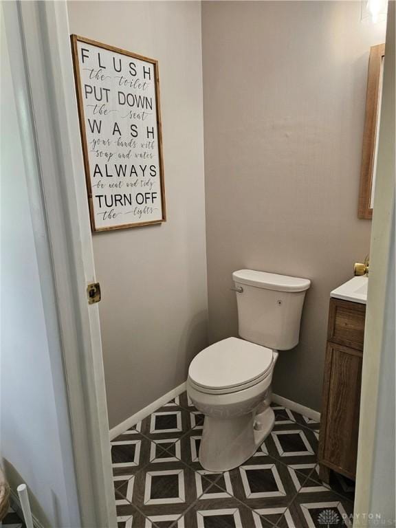 2547 Ryan Ct, Beavercreek, OH 45434 - half bath with vanity, toilet, and baseboards
