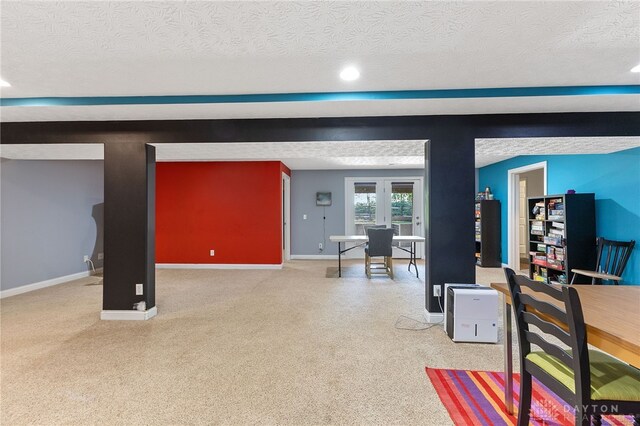 9300 Somerset Ct, Clearcreek Twp, OH 45458 - living room with a textured ceiling, light colored carpet, baseboards, and recessed lighting