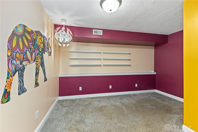 9300 Somerset Ct, Clearcreek Twp, OH 45458 - empty room with a textured ceiling, a chandelier, carpet floors, and baseboards