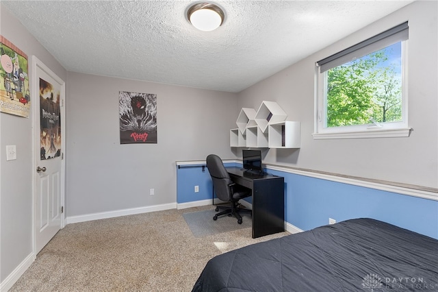 9300 Somerset Ct, Clearcreek Twp, OH 45458 - carpeted bedroom featuring a textured ceiling, a desk, and baseboards