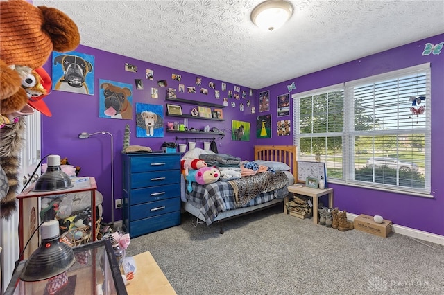 9300 Somerset Ct, Clearcreek Twp, OH 45458 - carpeted bedroom with a textured ceiling and baseboards
