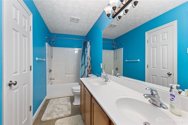 9300 Somerset Ct, Clearcreek Twp, OH 45458 - full bath with shower / bath combo, toilet, double vanity, tile patterned floors, and a textured ceiling