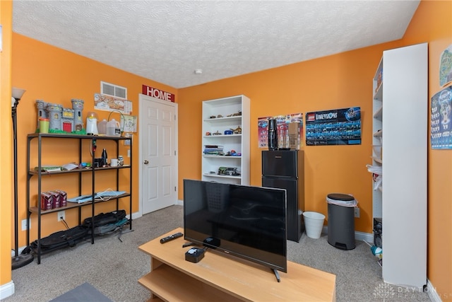 9300 Somerset Ct, Clearcreek Twp, OH 45458 - carpeted home office with a textured ceiling and baseboards